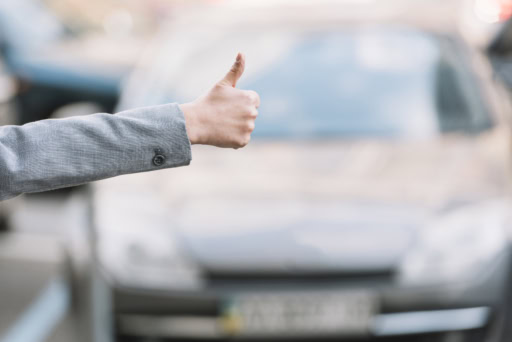 businesswoman-calling-taxi